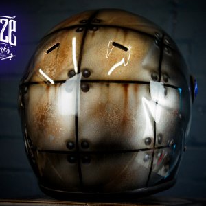 Brown weathered anatomical skull design painted on motorcycle helmet with bone texture and realistic shading effects